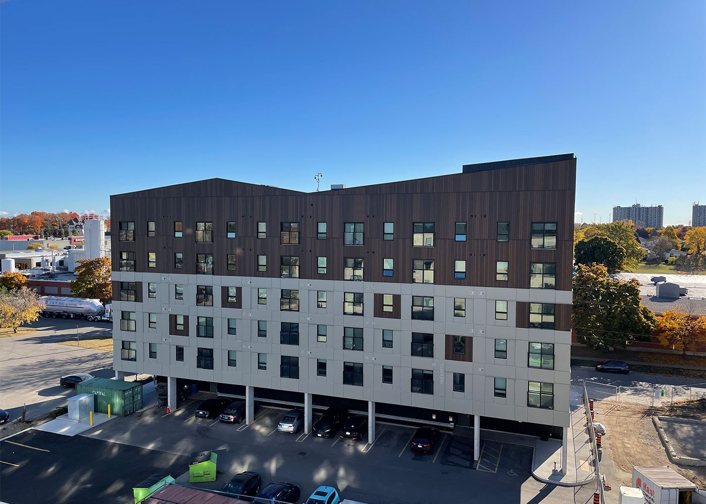 Rear of the completed building above covered parking