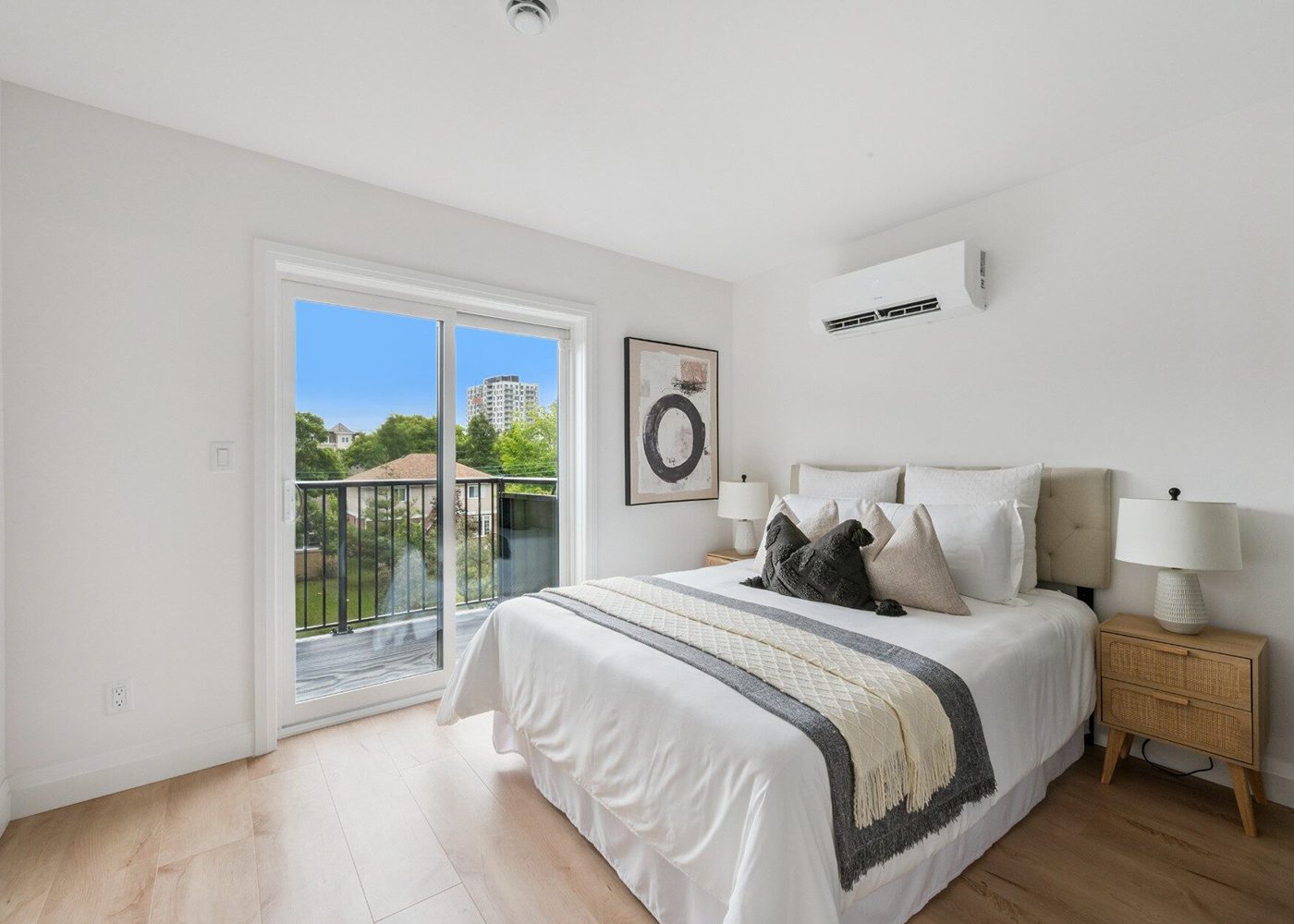 Bedroom with a sliding door to a balcony