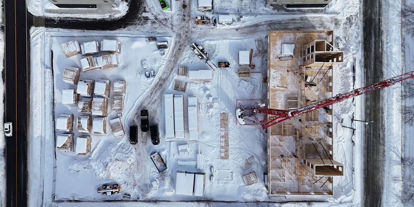 Overhead winter view of the timber structure under construction